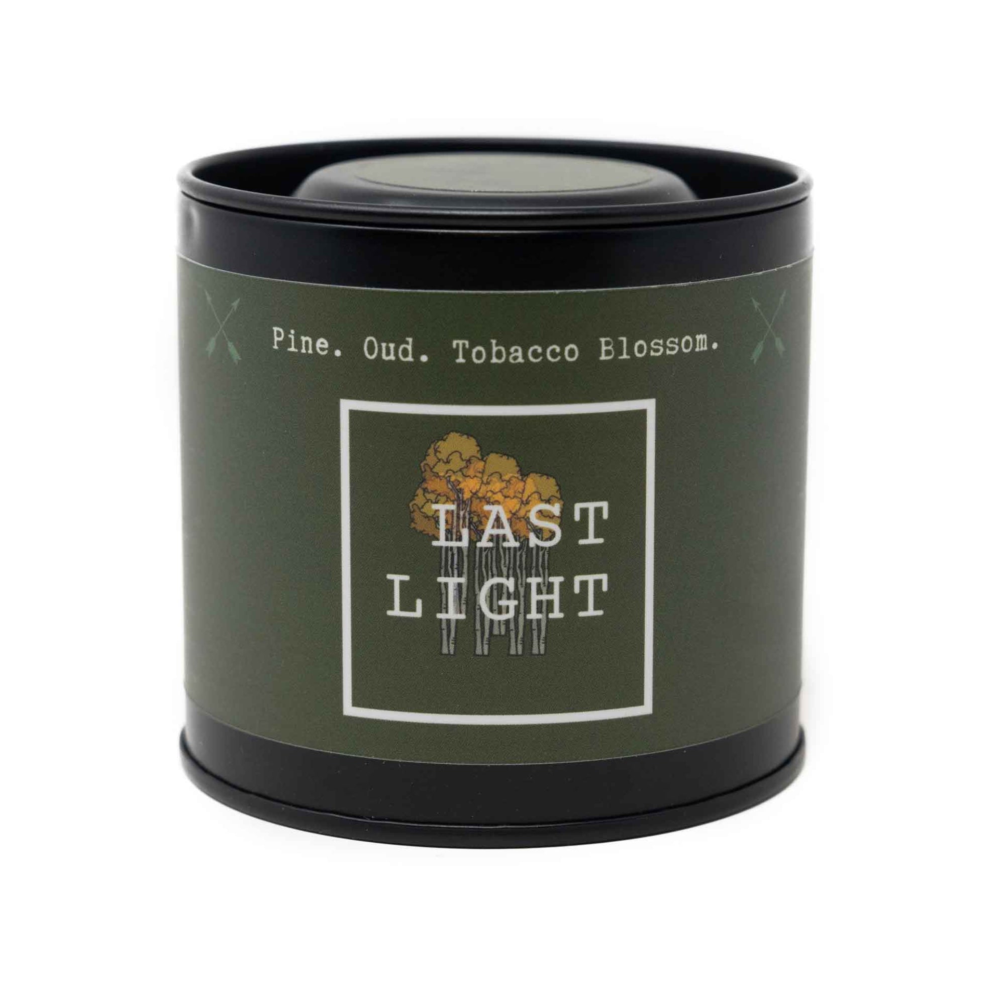 Last Light pine, oud, and tobacco blossom scented candle.
