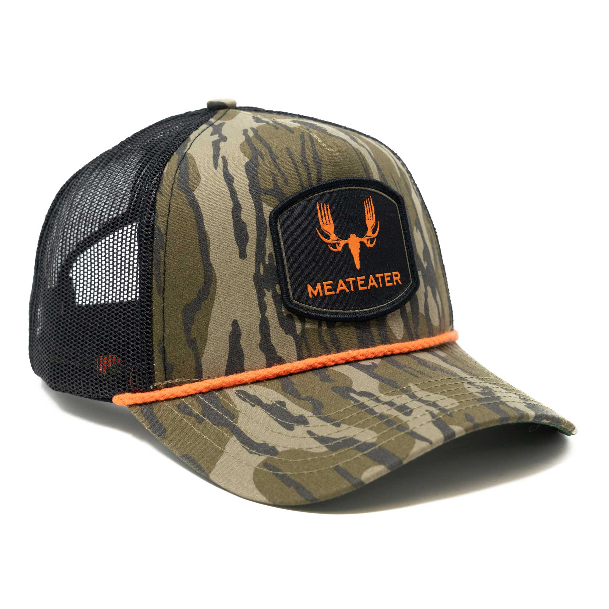 Camo trucker hat with black mesh back, orange rope, and "MEATEATER" antler logo patch.