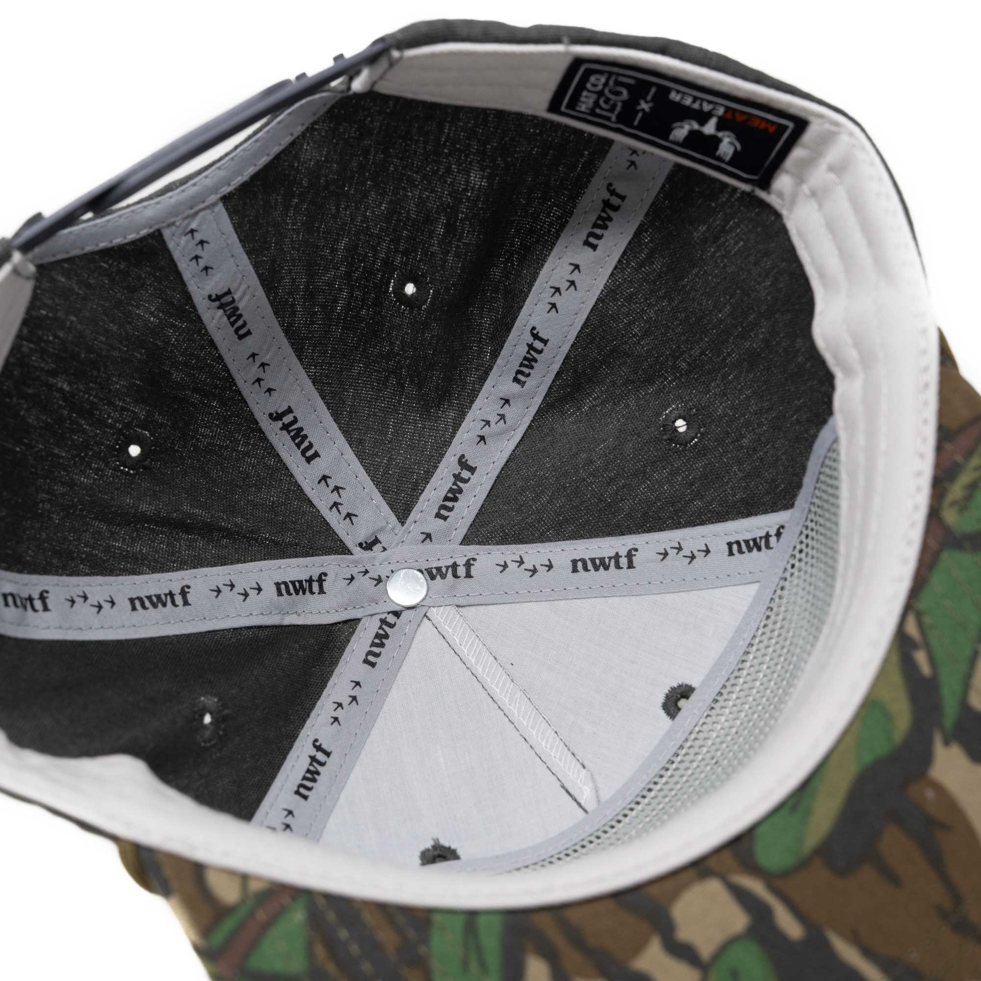 Inside of black and camo baseball cap with grey NWTF logo straps and MeatEater tag.