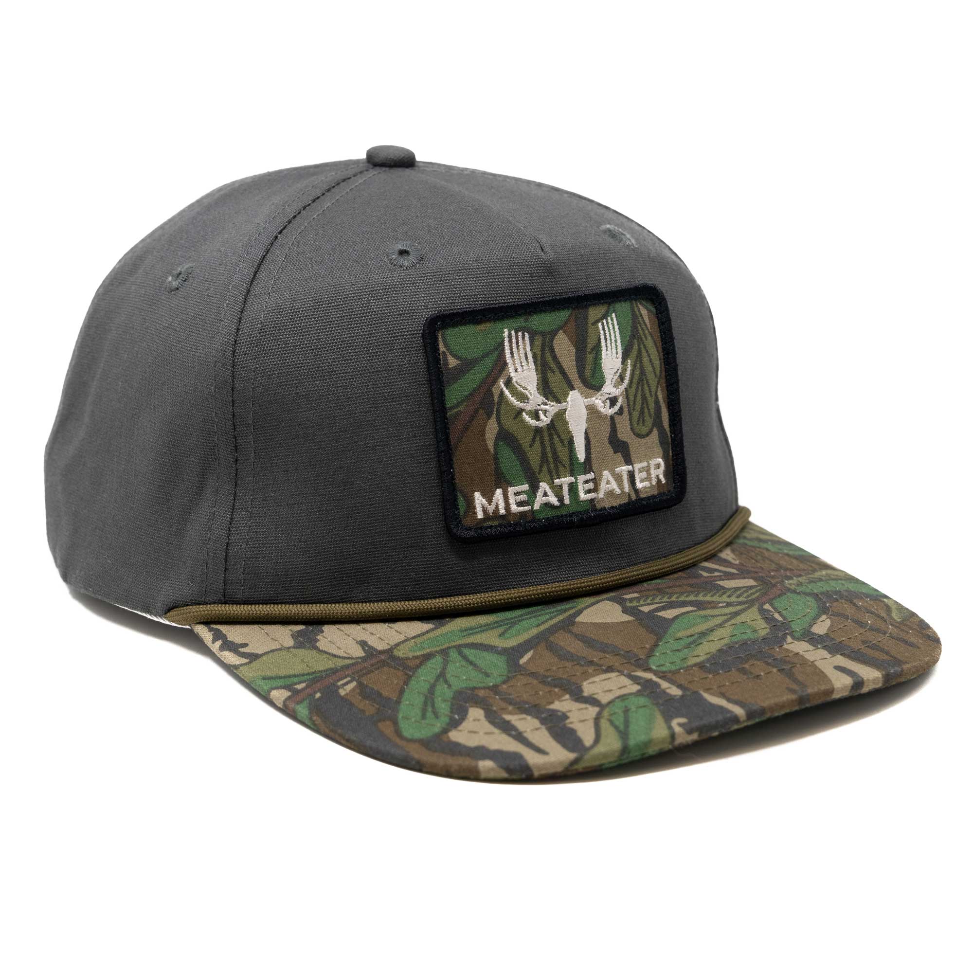 Grey cap with camouflage brim, MeatEater logo (antlers/forks), and green rope trim.