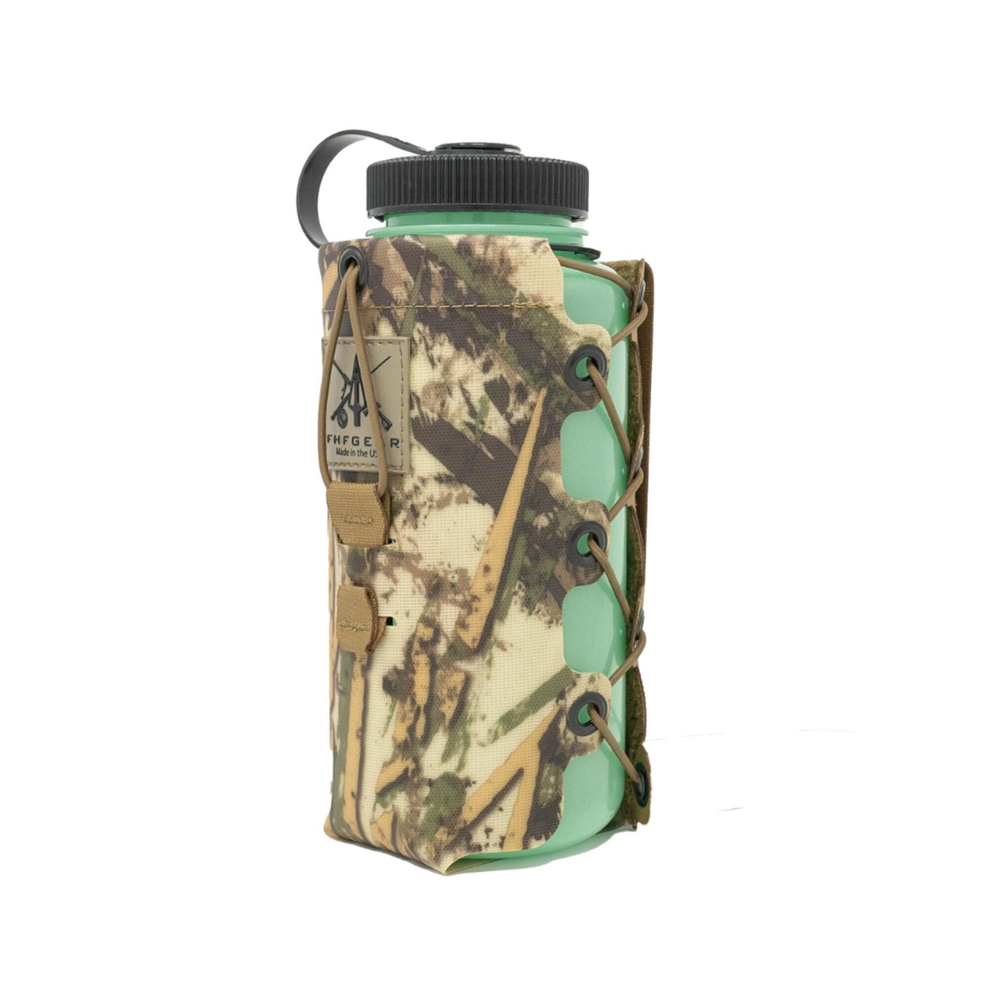 Mint green water bottle with black cap in a camouflage holder with tan lacing.