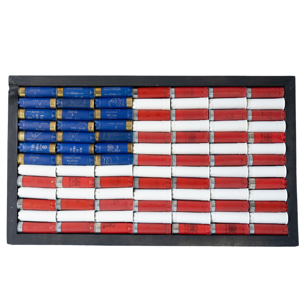 Framed art of red, white, blue shotgun shells forming an American flag.