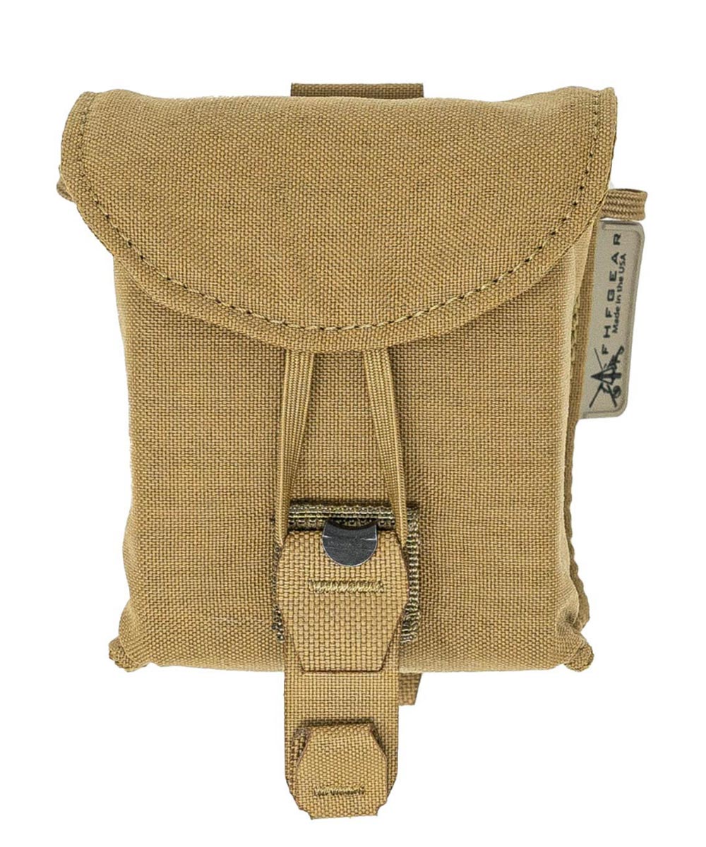 Coyote brown tactical pouch with flap closure, shock cord and pull tab.