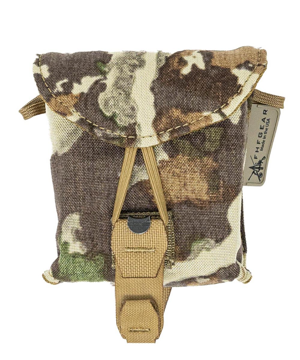 Multicam gear pouch with top flap closure and tan front strap.