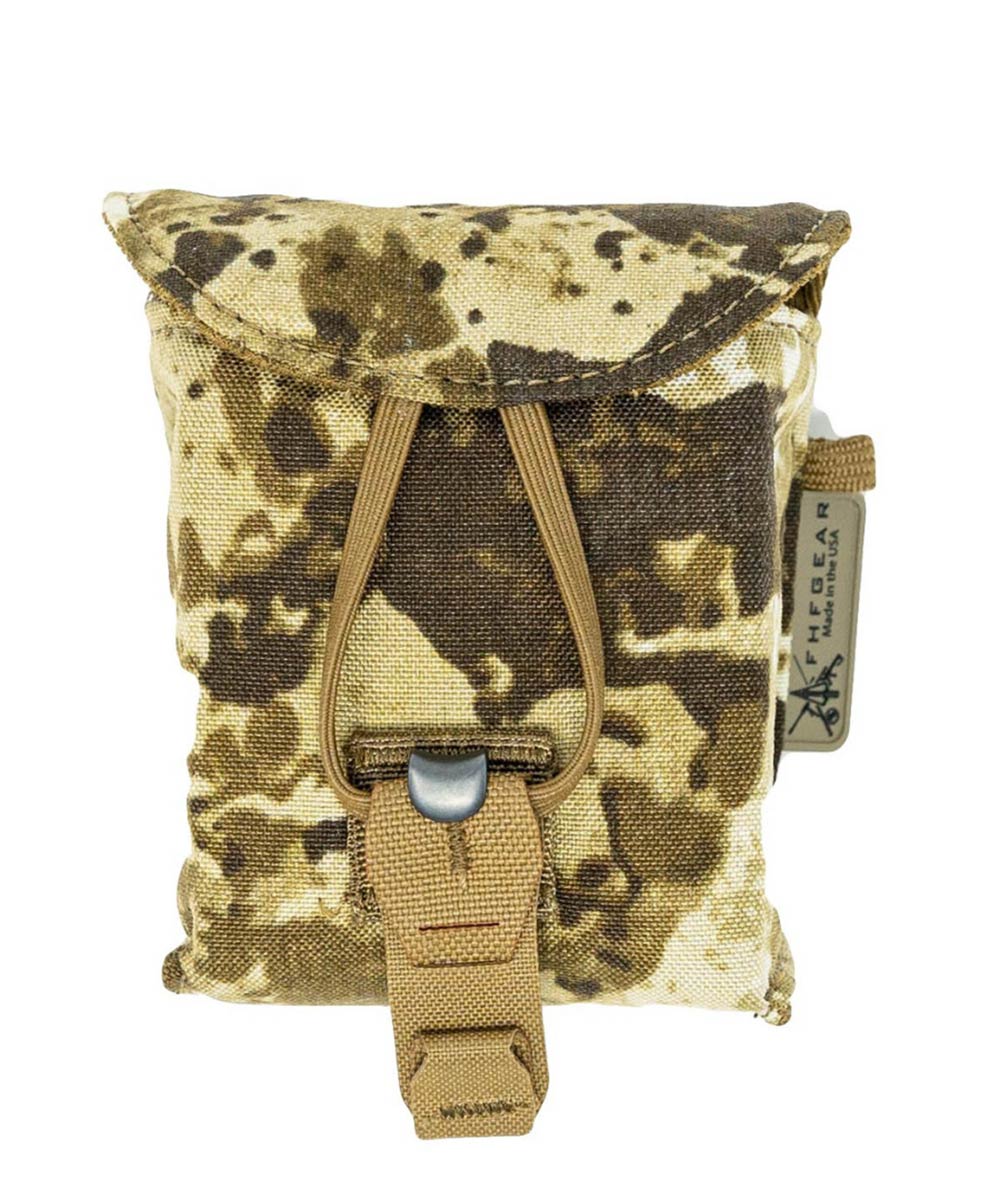 Desert camo gear pouch with flap closure and bungee strap.