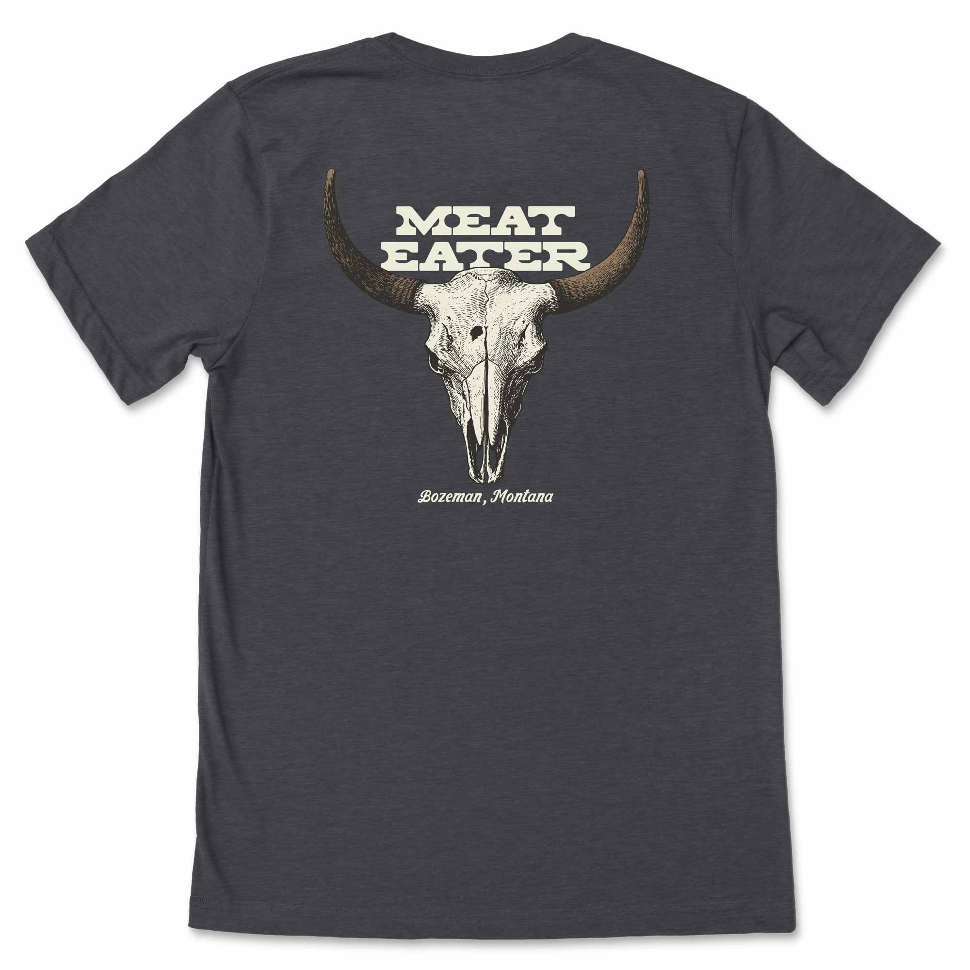 Dark gray t-shirt with a bison skull graphic and 'Meat Eater' text on the back, set against a white background.