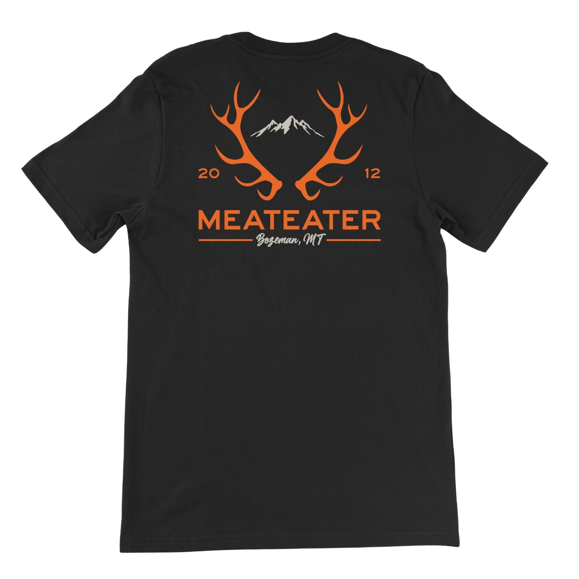 Black t-shirt with orange antlers, white mountains, "MEATEATER Bozeman, MT" (2012).