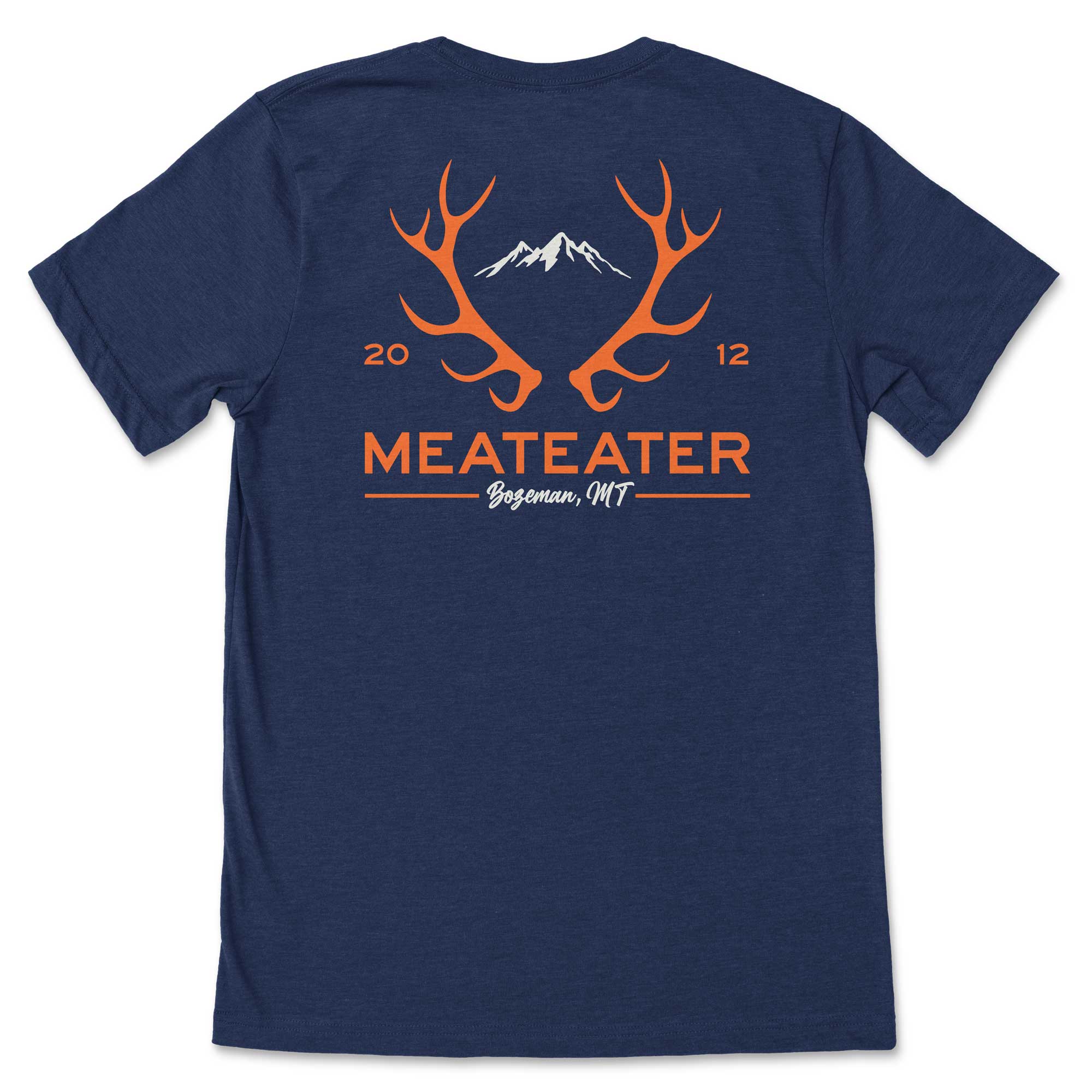 Navy blue t-shirt with orange antlers, white mountains, and "MEATEATER Bozeman, MT 2012" text.