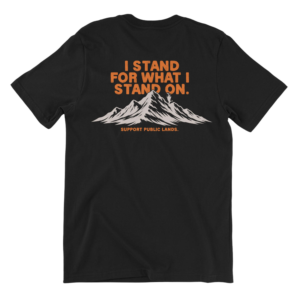 Black T-shirt featuring at the top the text in orange "I STAND FOR WHAT I STAND ON.", mountains in beige in the middle and the text in orange "SUPPORT PUBLIC LANDS." beneath.