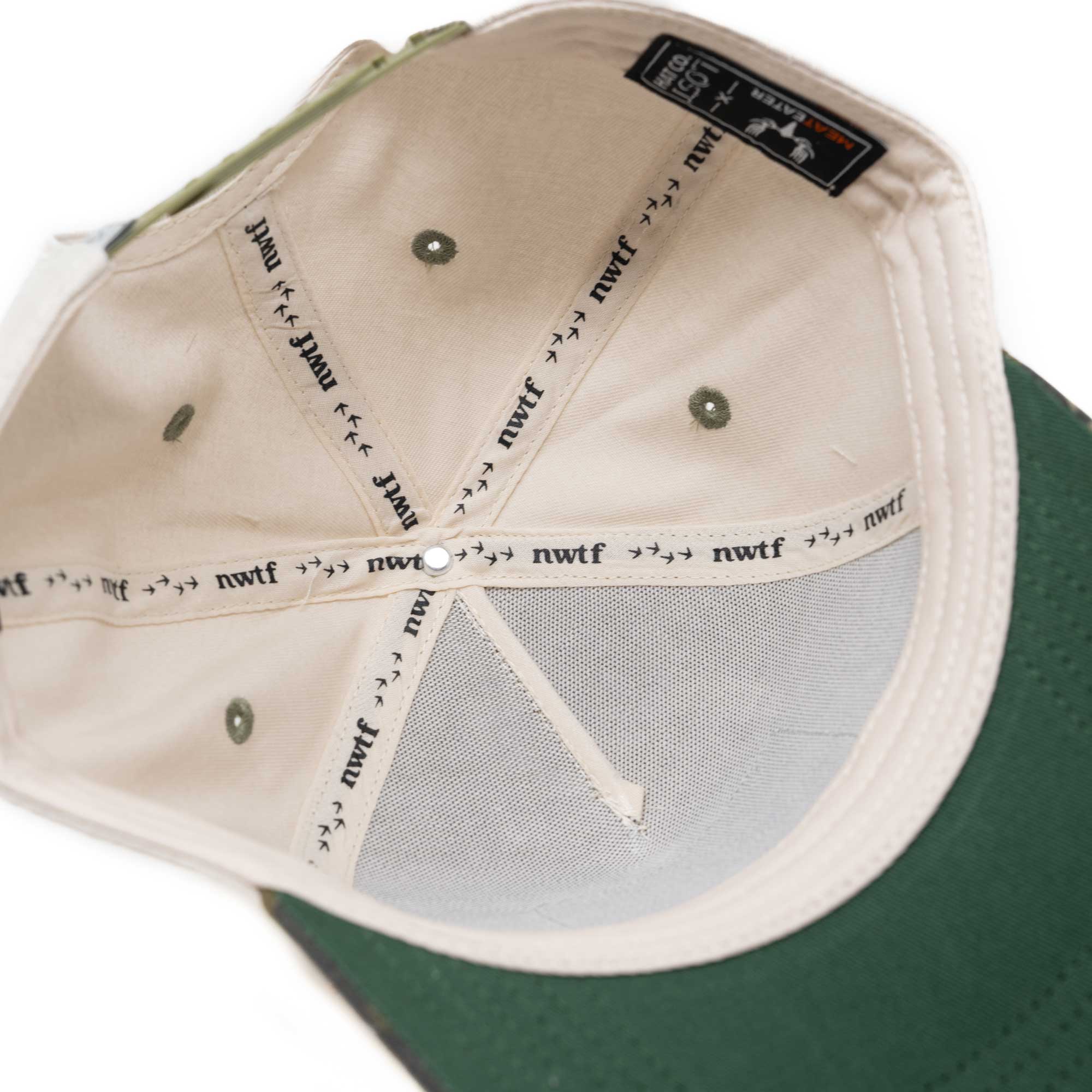 Beige baseball cap interior, green brim, 'nwtf' bird-logo taping, Lost Hat Co. label.