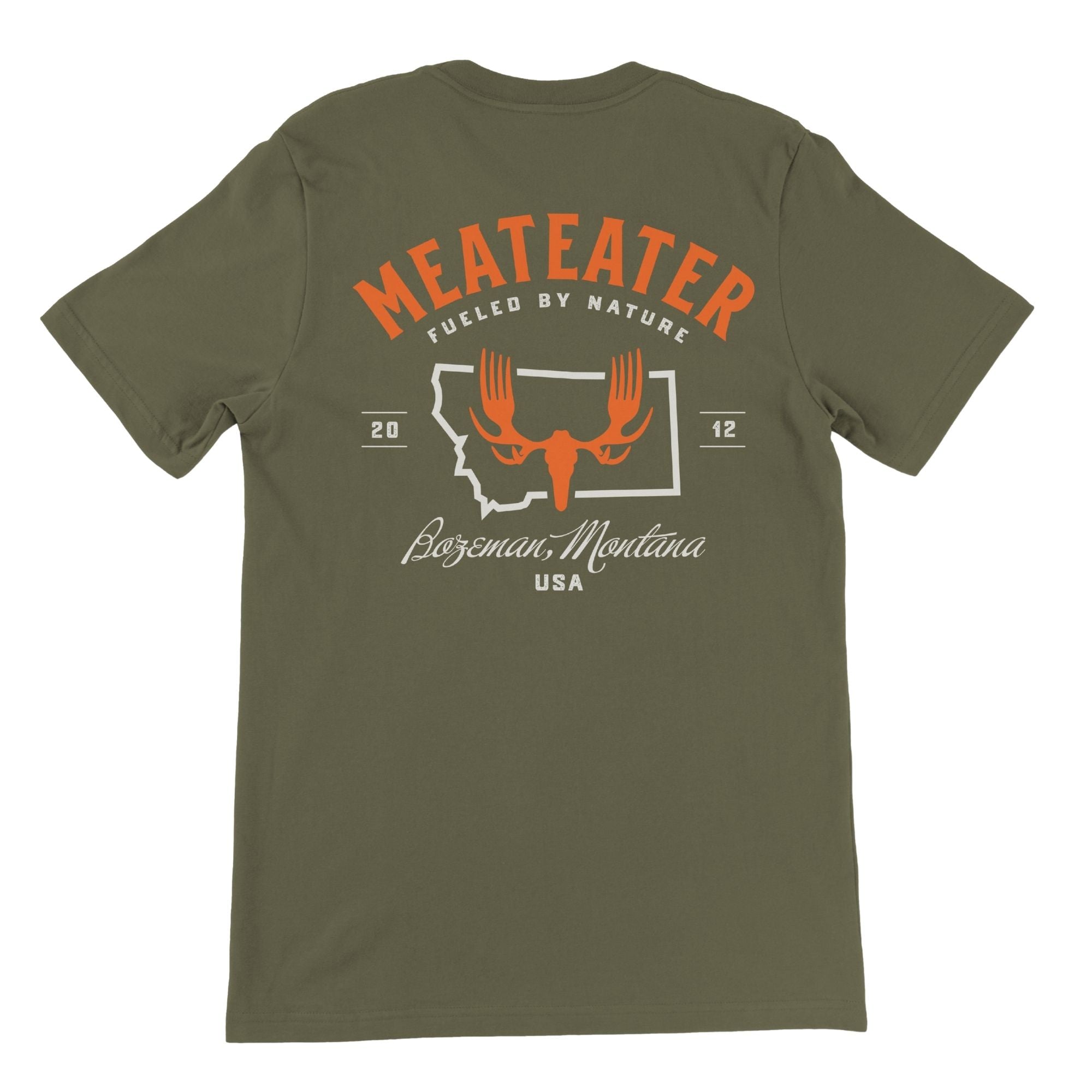 Military green t-shirt with "MEATEATER Fueled by Nature Bozeman Montana" text and MEATEATER logo at the center.