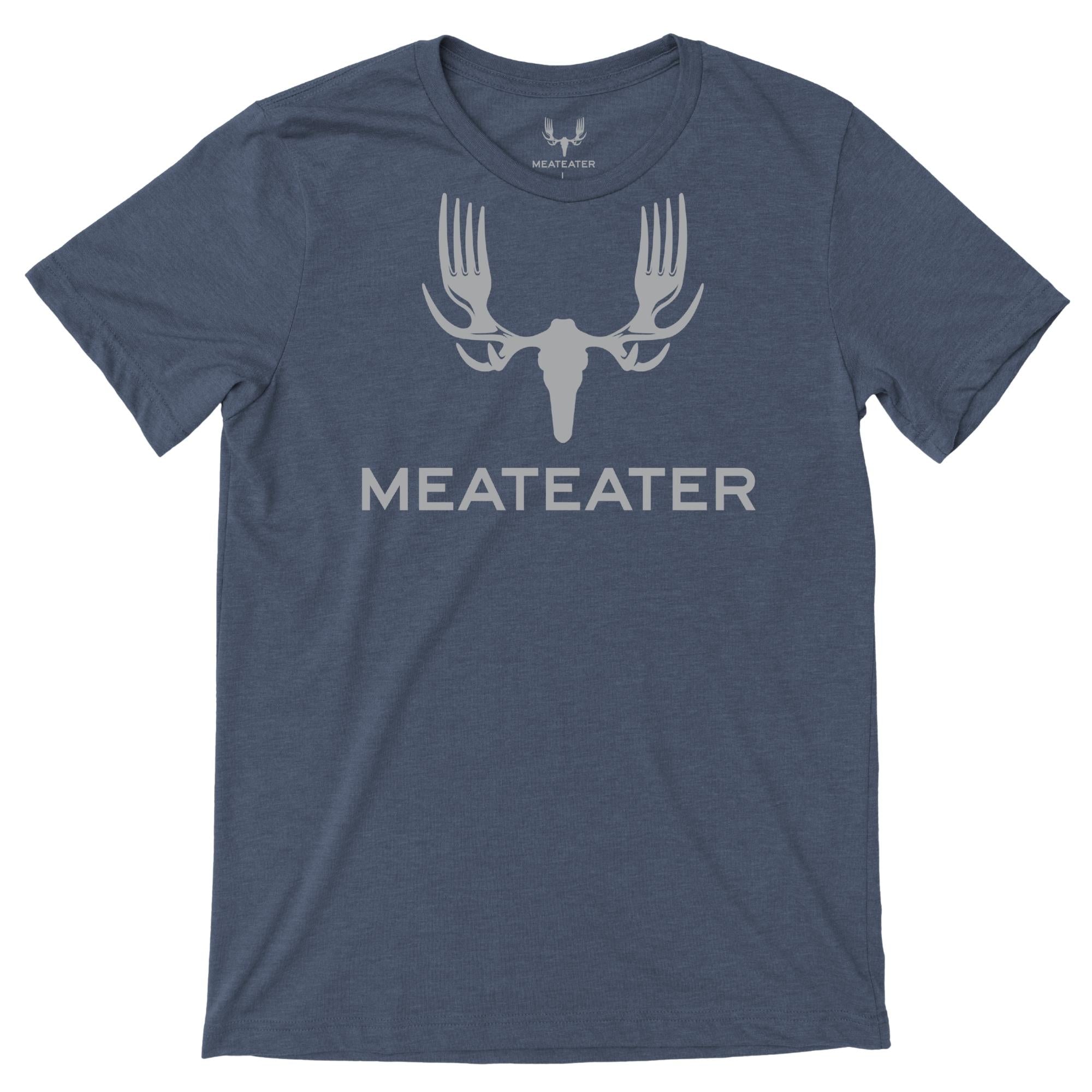 Navy heather t-shirt with light grey skull-and-forks graphic and "MEATEATER" text.