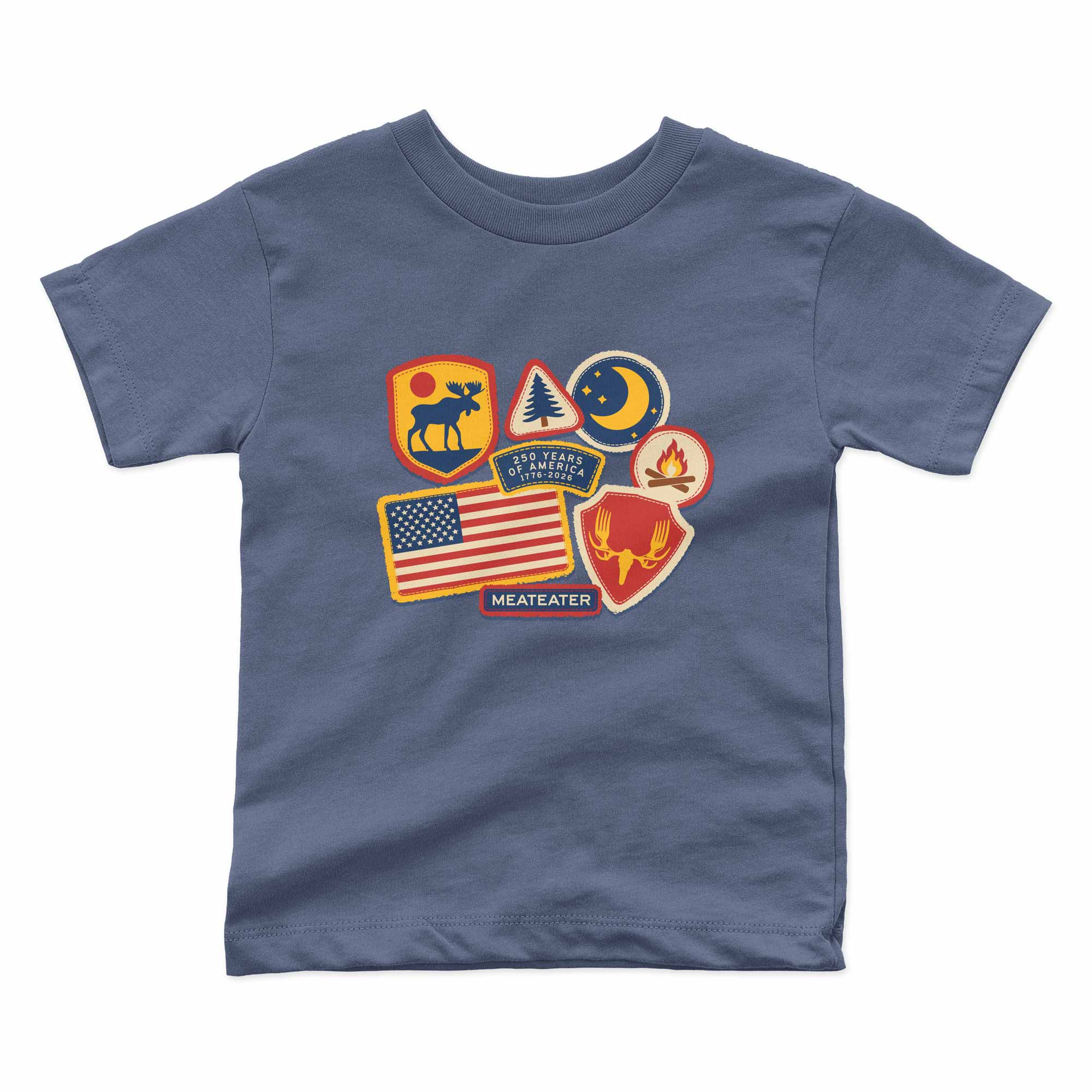 Blue t-shirt with colorful patch graphic designs on a white background