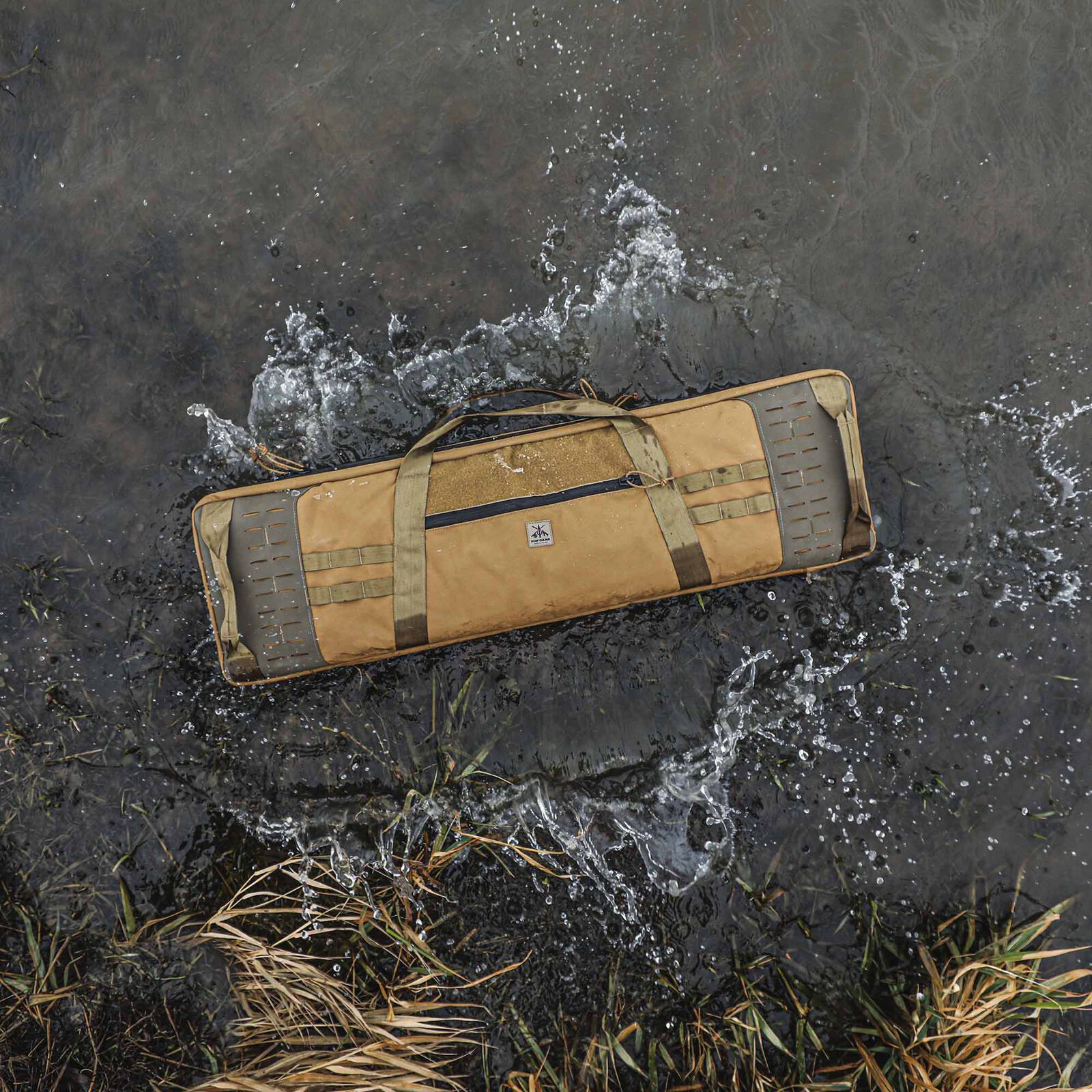 FHF Gear tan tactical rifle case with olive straps & MOLLE, splashing in water.