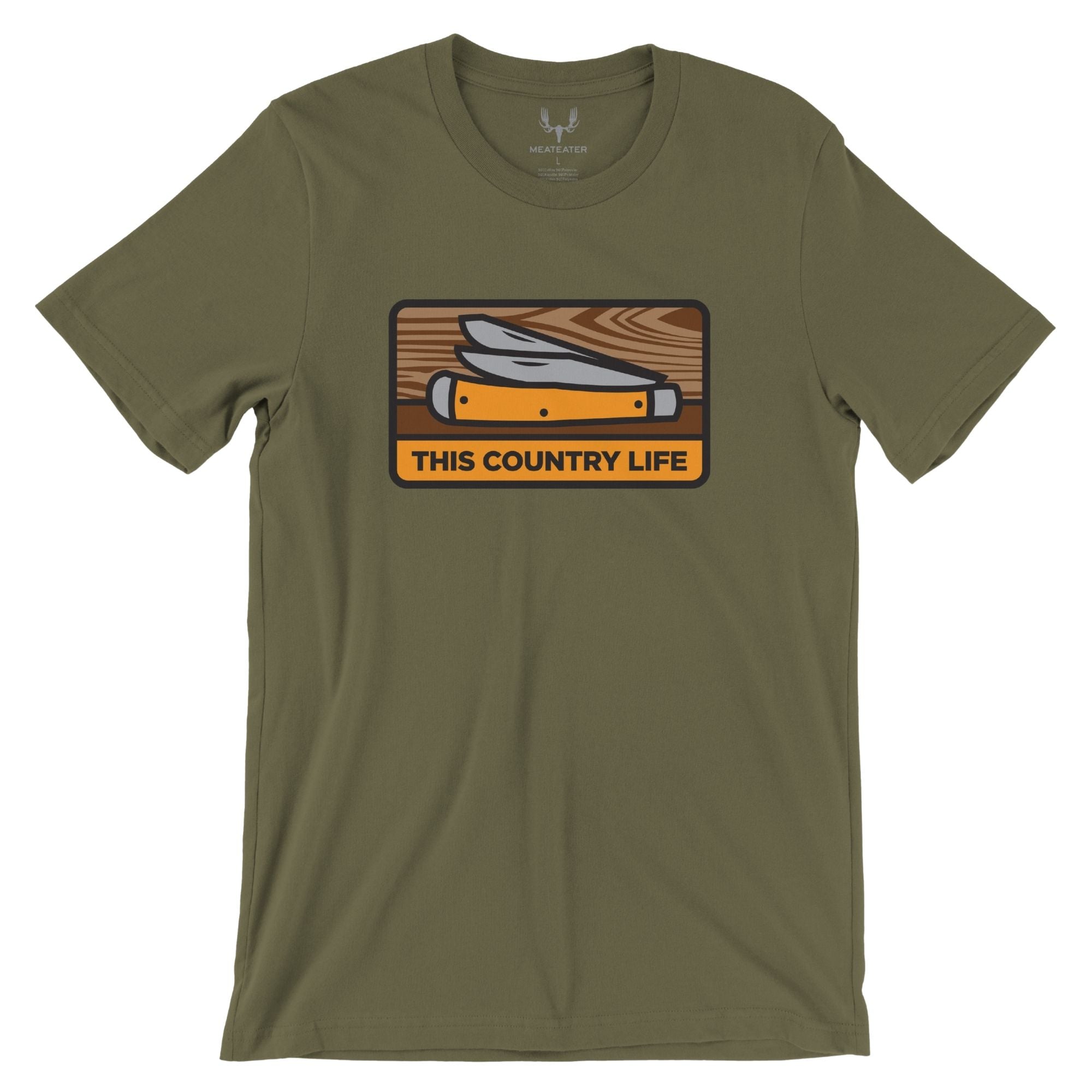 Military green t-shirt featuring an orange folding knife graphic on wood with 'THIS COUNTRY LIFE' text.